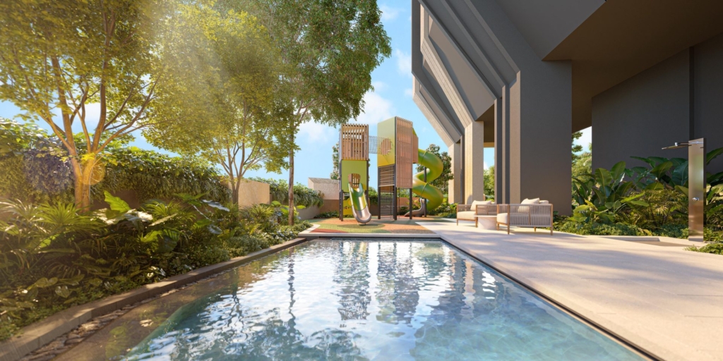 Children's pool and playground with tube slide at The Serra Residences, a freehold condo in Novena District 11
